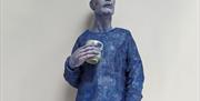 Ceramic sculpture titled 'Benedict with cup' by Pete Garrard